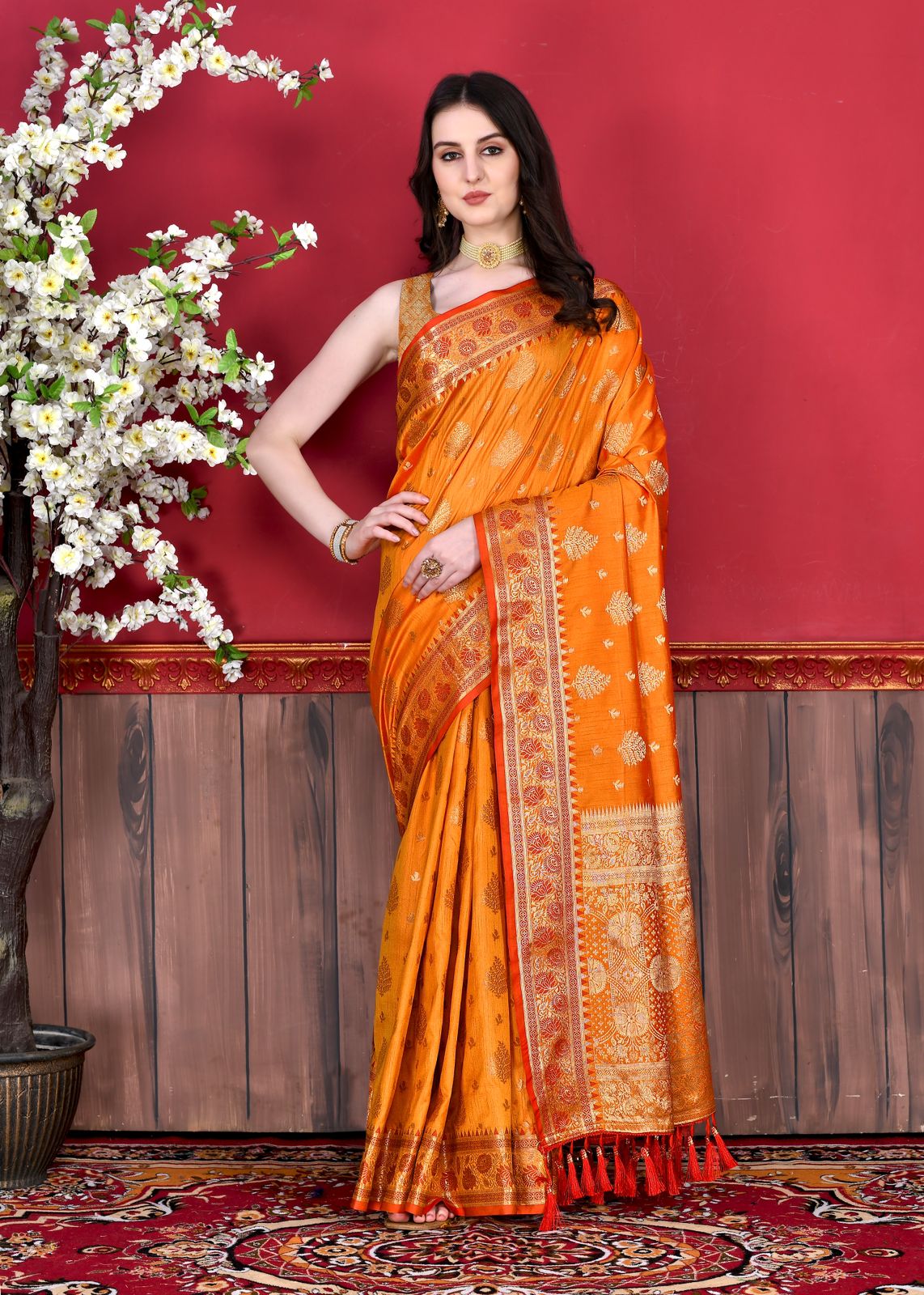 Radiant Sunset Orange Silk Saree with Intricate Embroidery